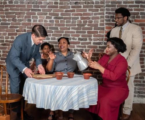 Tim Gouran, Ajani Dickerson, Marlette Buchanan, Deja Culver, and Arlando Smith in A Raisin in the Sun at Taproot Theatre. Photo by Robert Wade.